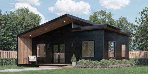 Image of an accessory dwelling unit in Atlanta, Georgia, with black siding and a patio area. 