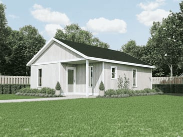 An accessory dwelling unit sitting on a Atlanta, GA, home property with white siding and a dark green roof. 
